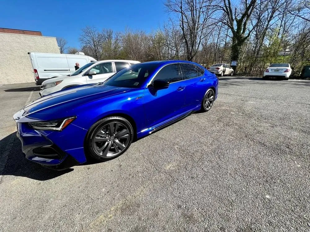 Blue Acura TLX A-Spec fully detailed, parked outdoors